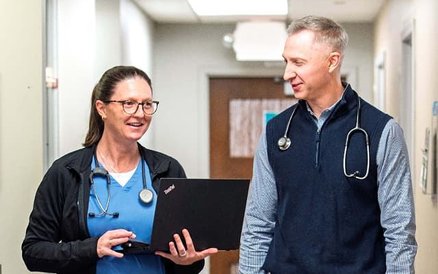 Kidney Specialists of Minnesota physician and nurse coordinating team-based nephrology care